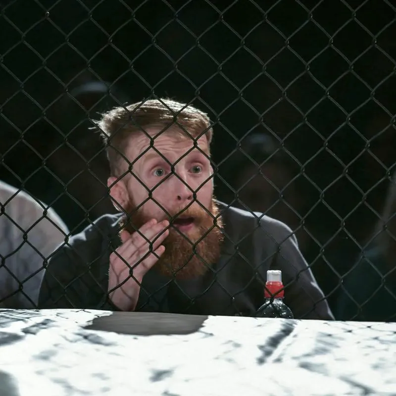 Paddy Holohan watching from behind the cage
